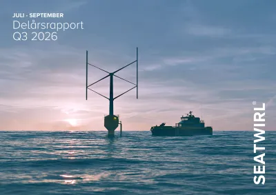 A vertical-axis wind turbine and a service vessel at sea against a low sun